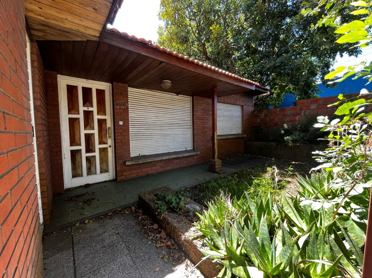 Chalet con Patio, Parrillas y Garage Doble 