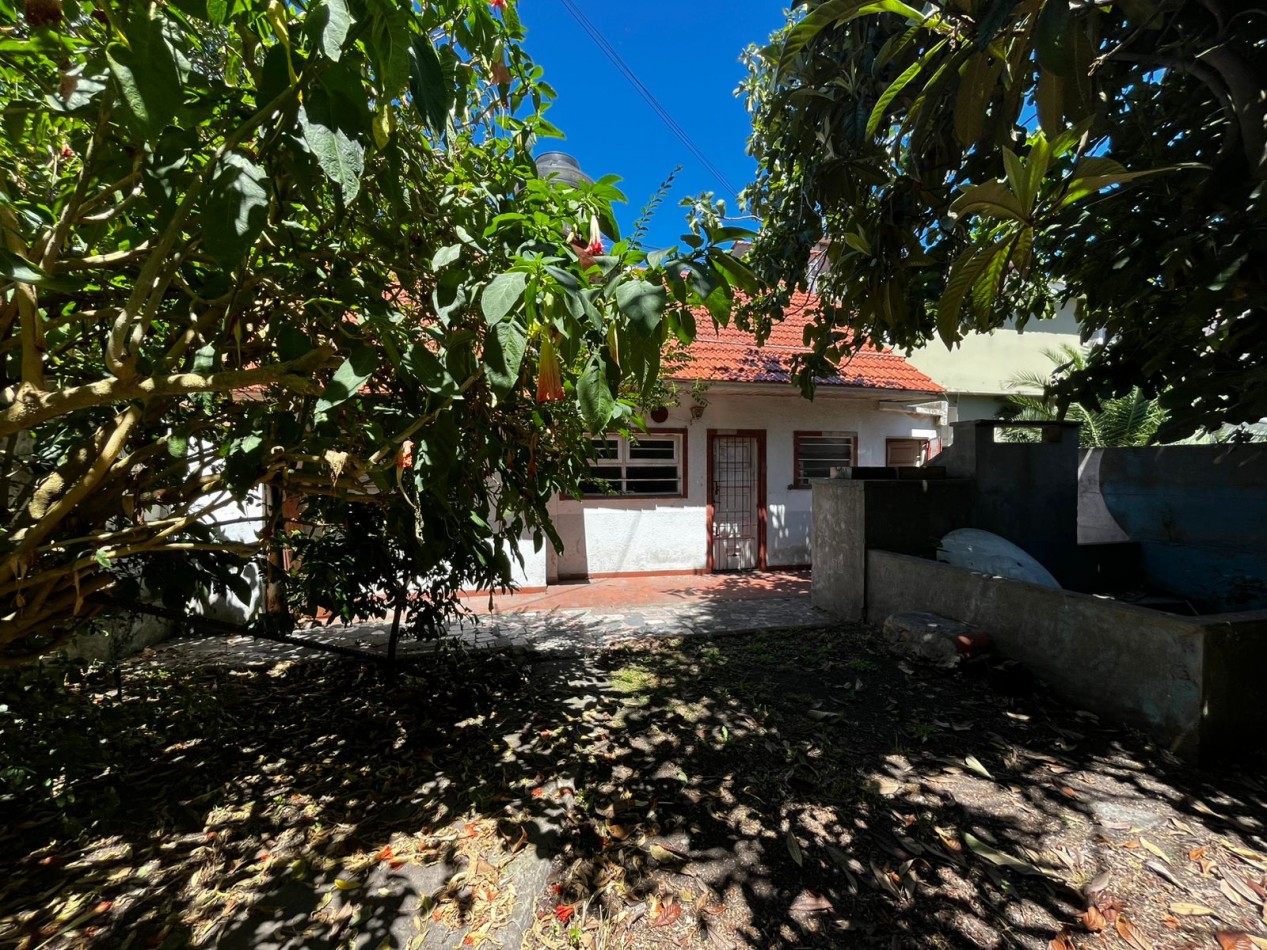 Chalet con Patio, Parrillas y Garage Doble 